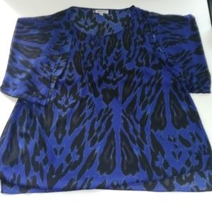 Jennifer Lopez comfy cross over blouse